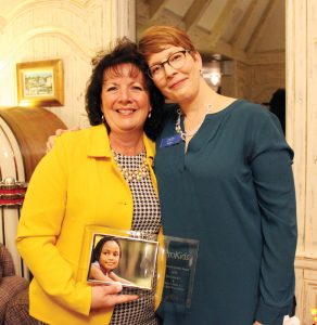Chris Bochenek of the Carol Ann & Ralph V. Haile Jr./U.S. Bank Foundation with Tracy Cook