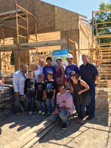 The Munoz family with volunteers from Western & Southern
