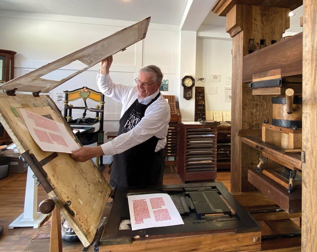 Gary Walton demonstrates Gutenberg press